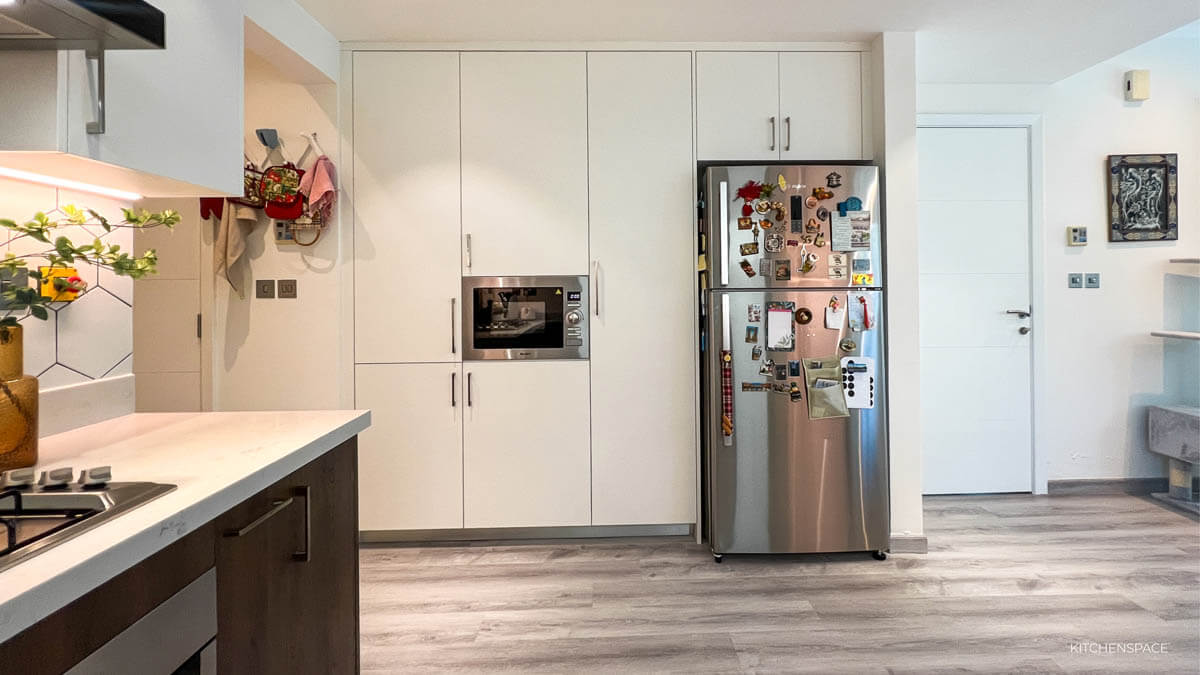 Walnut Kitchen with Geometric Backsplash